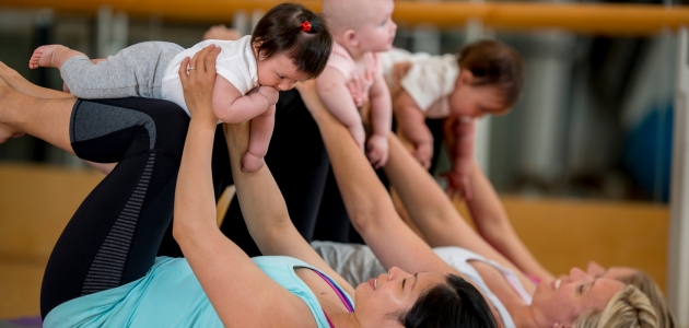 Mother and babies laying on floor